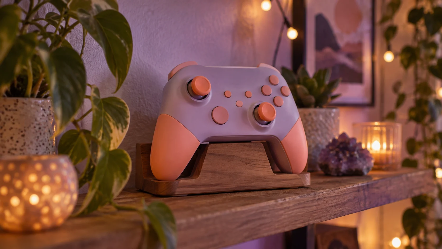 An original lavender and coral controller rests on a wooden stand.