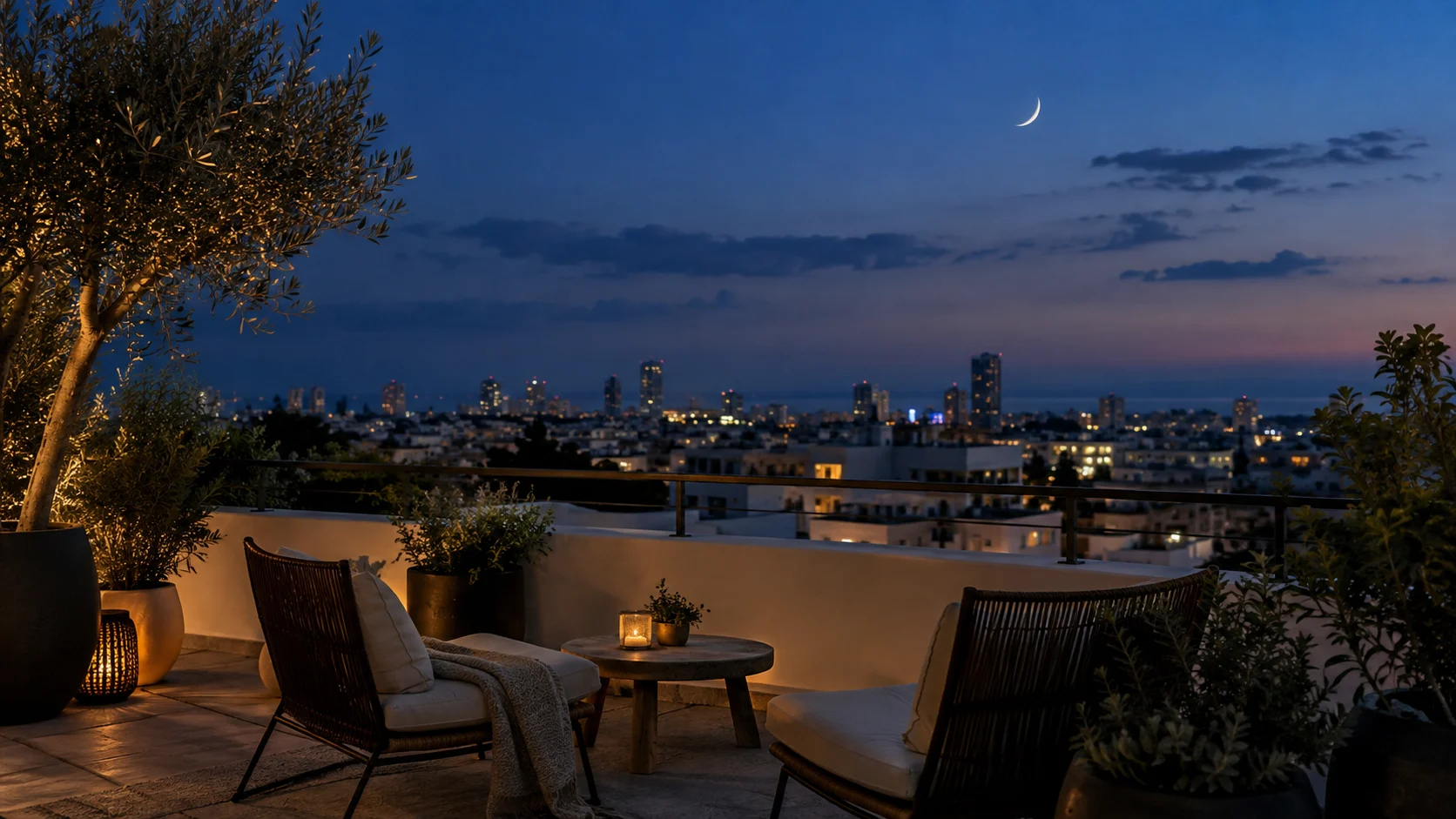 Moonlight falls across an empty rooftop terrace above a sleeping city.