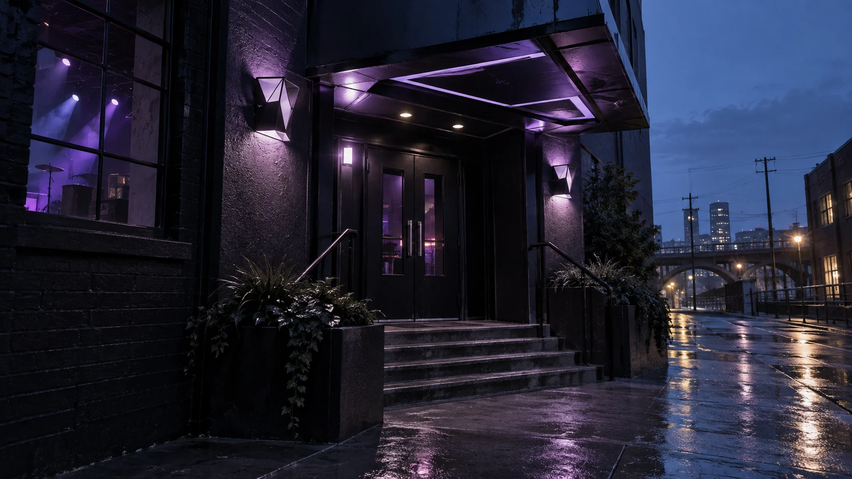 An empty black venue entrance reflects lavender light after rain.